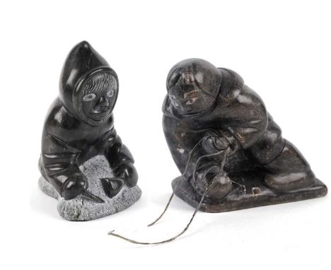 Two 20th Century Canadian Inuit carved stone abstract figural sculptures, the first impressed marks, and signature Caroline N