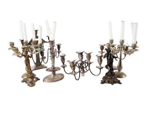 A silver plated Art Nouveau twin branch candelabra, fitted for the three candles, the cylindrical supports decorated with wre
