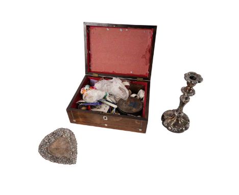 An Edwardian white metal heart-shaped trinket dish, the border pierced and moulded with figures, animals and scrolls, raised 