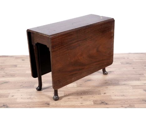 A George III mahogany Pembroke table, with rectangular top flanked by D-shaped leaves, opening onto gate leg supports, raised