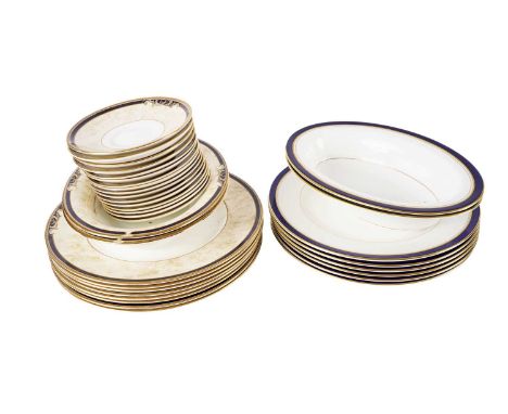 A Royal Worcester 'Howard' pattern part dinner service, comprising six circular dinner plates and two oval serving bowls; tog