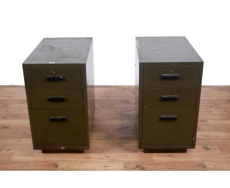 A pair of vintage metal filing cabinets, with three graduated drawers, painted green, 40 x 65 x 71cms high.