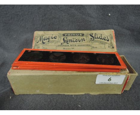 A set of two magic lantern slide sets by Primus with original boxes