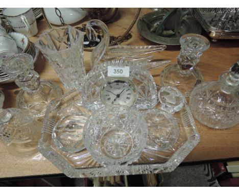 A selection of glass ware including crystal concept clock, dressing table pots etc