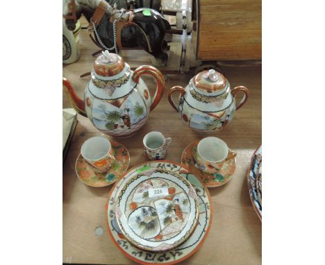 An Oriental part tea coffee service of fine china with hand painted decoration