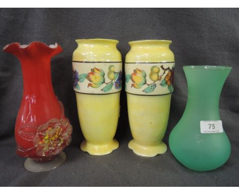 A pair of vintage ceramic vases and carnival style glass ware