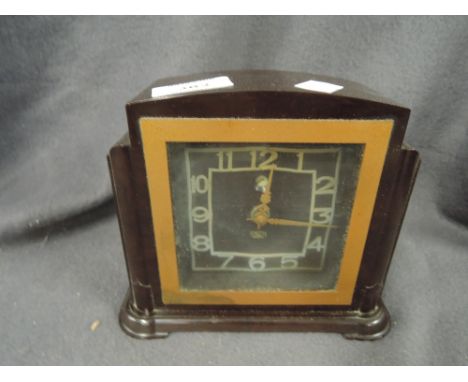 A vintage Smith bakelite mantle clock in an Art Deco style