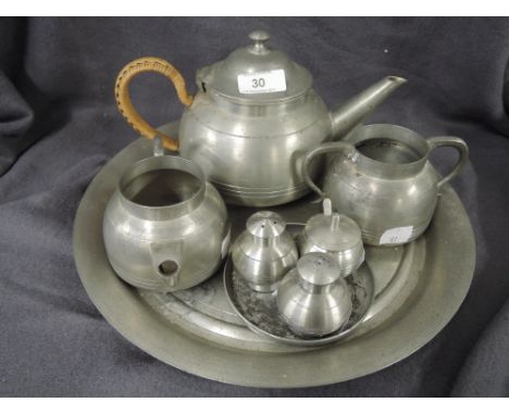 A tea coffee service by the Selangor Pewter company