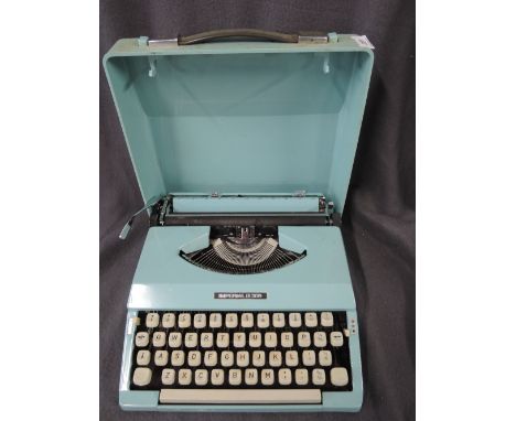 A vintage Imperial 200 baby blue typewriter