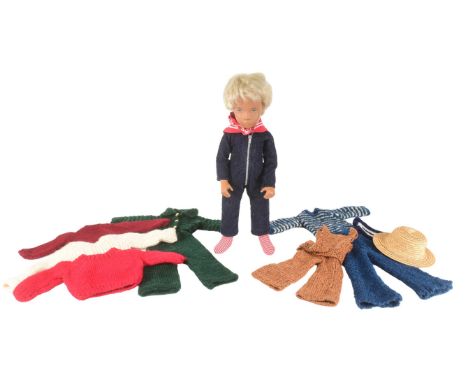 Sasha Doll - an original vintage 1970s vinyl Sasha doll with a quantity of additional handmade clothing. The doll with hand p