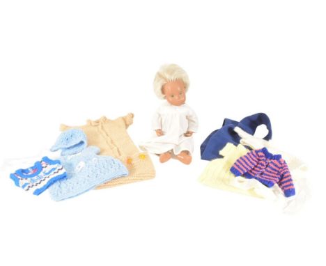 Sasha Doll - an original vintage 1970s vinyl Sasha doll with a quantity of additional handmade clothing. The doll with hand p
