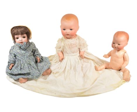 A collection of x3 early 20th Century German bisque headed dolls comprising; Edward Edelmann ' Melitta ' wearing a blue flora