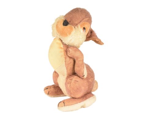 A vintage c1950s soft toy of 'Thumper' from the Disney animated film Bambi. Made in England by Merrythought, firmly stuffed m