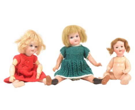 A collection of x3 early 20th Century German bisque headed dolls comprising; Armand Marseille with blue fixed eyes wearing a 