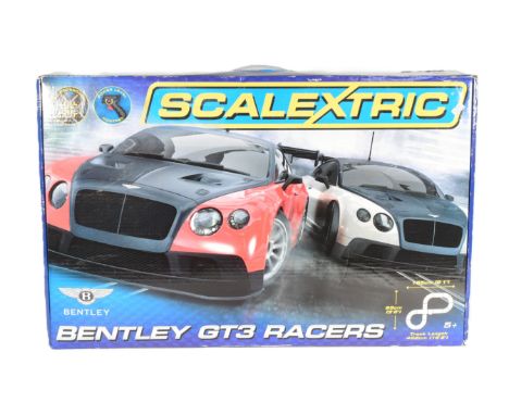 Scalextric - a Bentley GT3 Scalextric slot car racing set. The set containing Bentley GT3 red, Bentley GT3 white, power level