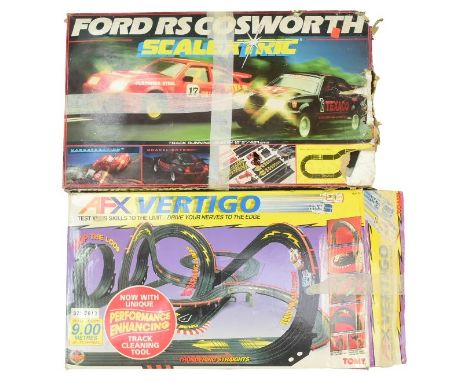 Scalextric - an original vintage Hornby made Scalextric slot car racing set Ford Rs Cosworth together with a Tomy AFX Vertigo