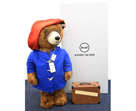 Large Steiff Paddington Bear with chestnut mohair, brown eyes, jointed limbs, stitched features and button to ear. Wearing hi