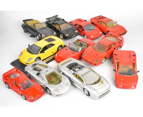 Eleven 1:18 scale diecast model sports cars to include McLaren F1, Lamborghini Countach, Ferrari F40 and Porsche 930 Turbo.