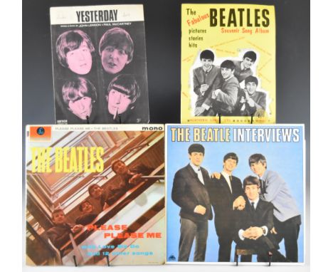 Five Beatles LPs together with 'Yesterday' sheet music and the Fabulous Beatles Souvenir song book. LPs are The Beatle Interv
