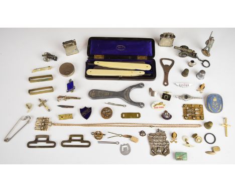 Pair of A. Barrett &amp; Sons cut-throat razors in felt-lined polished case, pair of lighters, military figure, small circula