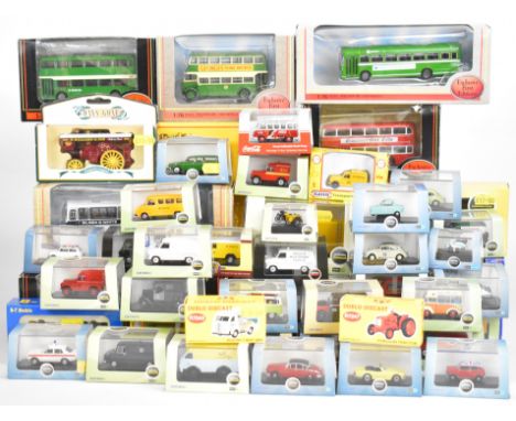 Fifty eight mostly Oxford 1:76 diecast model cars, truck and buses, all in original display boxes.