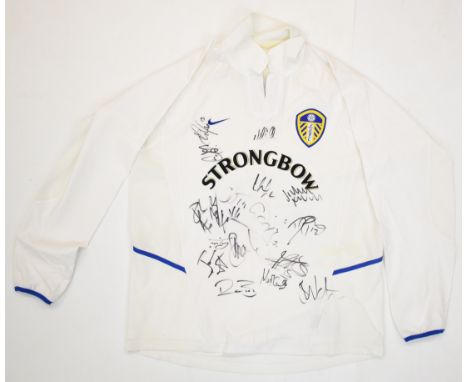 Leeds United F.C. multi-signed replica home shirt 2002 autographed by seventeen players