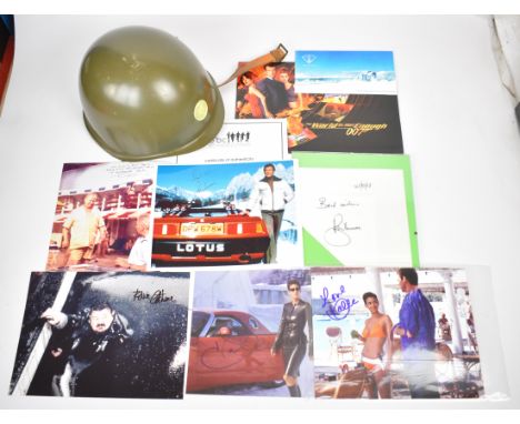 A collection of James Bond 007 related ephemera to include signed framed montage with large colour print of Halle Berry in bi