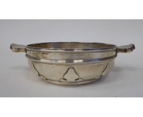 A late Victorian silver quaiche with hollow tab handles, applied wire rims and a uniform foliate frieze&nbsp; Pairpoint Broth