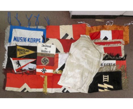 A collection of Nazi era, fabric banners and flags: to include swastika and SS emblems (Please Note: this lot is subject to t