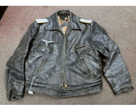 A German Luftwaffe pilots black leather flight jacket with zip fasteners (Please Note: this lot is subject to the statement m