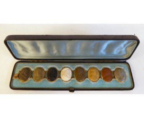 An antique yellow metal mounted, intaglio bracelet, set in various colours with a series of eight cameo head and shoulder por