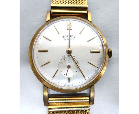 A Trebex 18ct gold bracelet watch, the manual wind movement faced by a baton dial