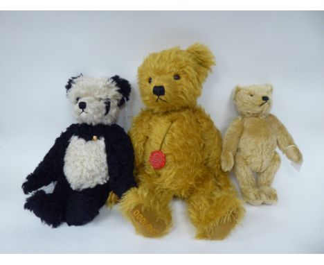 A Herman Original golden plush covered mohair Teddy bear with a mobile head, limbs, a stitched nose and a growler&nbsp; 16"h;