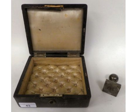 A German black hide jewellery box; and a stainless steel correspondence stamp with the engraved monogram of Eva Braun (Please