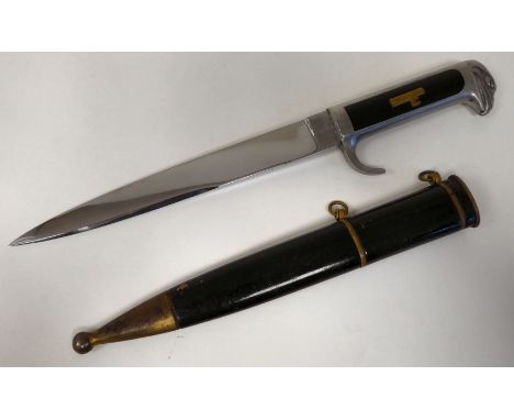 A World War II era Italian Fascist's dagger with an alloy birds' head pommel, the blade 7.5"L in a black enamel and brass she