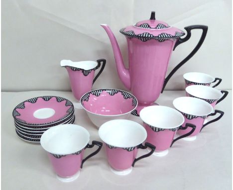 A Royal Worcester china coffee set, decorated in pink with black stripes&nbsp; bears a date cypher for 1920&nbsp; the coffee 