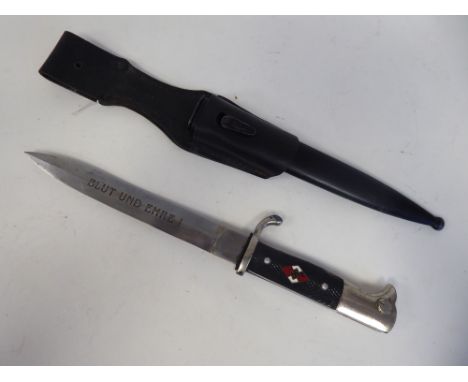 A German Nazi, Hitler Youth bayonet, an emblem on the handle, the Eichhorn blade with a motto and inscription&nbsp; 7.5"L, in