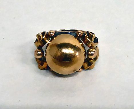 A 9ct gold ball design ring