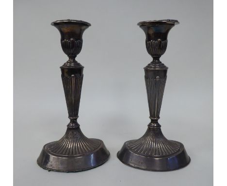 A pair of loaded silver oval candlesticks with demi-reeded decoration and detachable sconces&nbsp; HB&nbsp; Birmingham 1898&n