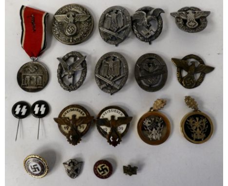 Miscellaneous German military and related badges: to include oval pin brooches; and a 1939 Kreissieger (Please Note: this lot