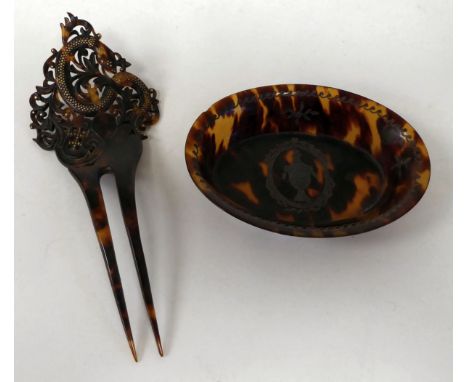 A 19thC carved tortoiseshell mantilla comb, decorated with studs and a serpent; and a contemporary oval tortoiseshell pin tra