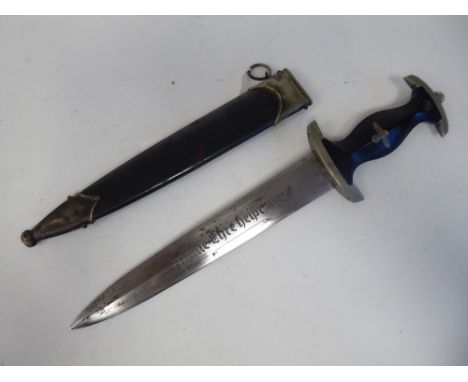 A German Nazi SS dagger, the black handle with emblems, the Eichhorn blade bearing a motto and Himmler inscription&nbsp; 8.5"