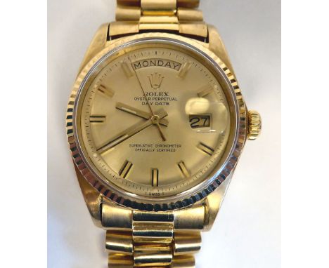 A Rolex Oyster Perpetual Day Date, 18ct gold cased bracelet wristwatch, the Superlitive chronometer faced by a gilded baton d