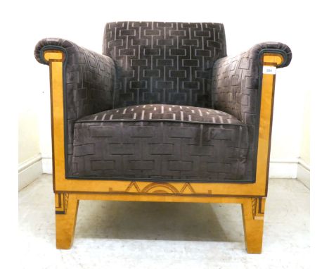 A modern Art Deco style showwood maple veneered and inlaid club armchair with a low back and enclosed, level arms, upholstere