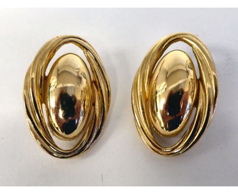 A pair of Christian Dior clip-on, yellow metal, oval earrings