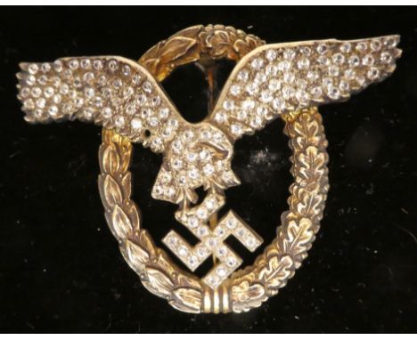 A German Third Reich era white metal brooch&nbsp; stamped 800, fashioned as a pin badge, in marcasite with a spreadeagle and 