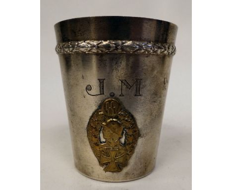 A German SS gilt metal and stainless steel beaker&nbsp; bears a gilded Nazi emblem and the engraved initials JM&nbsp; boxed (