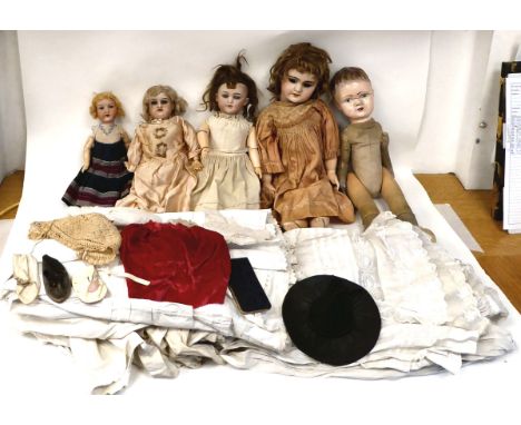Four various early 20thC French and German dressed dolls with ceramic heads and painted figures&nbsp; largest 18"h; and one i