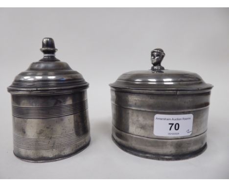 Two similar 19thC pewter tobacco jars with knopped lids and internally adjustable weights&nbsp; 3.5" &amp; 5"dia