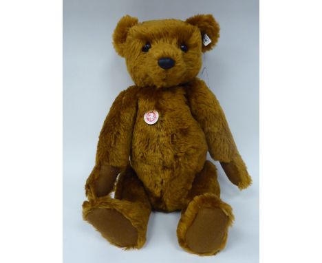 A Steiff chestnut brown coloured mohair covered Teddy bear with a mobile head and limbs&nbsp; 20"h